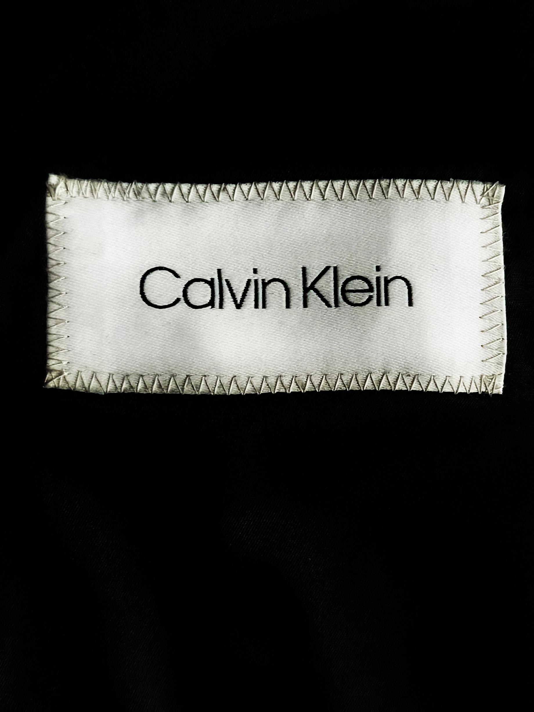 Calvin Klein - [L]
