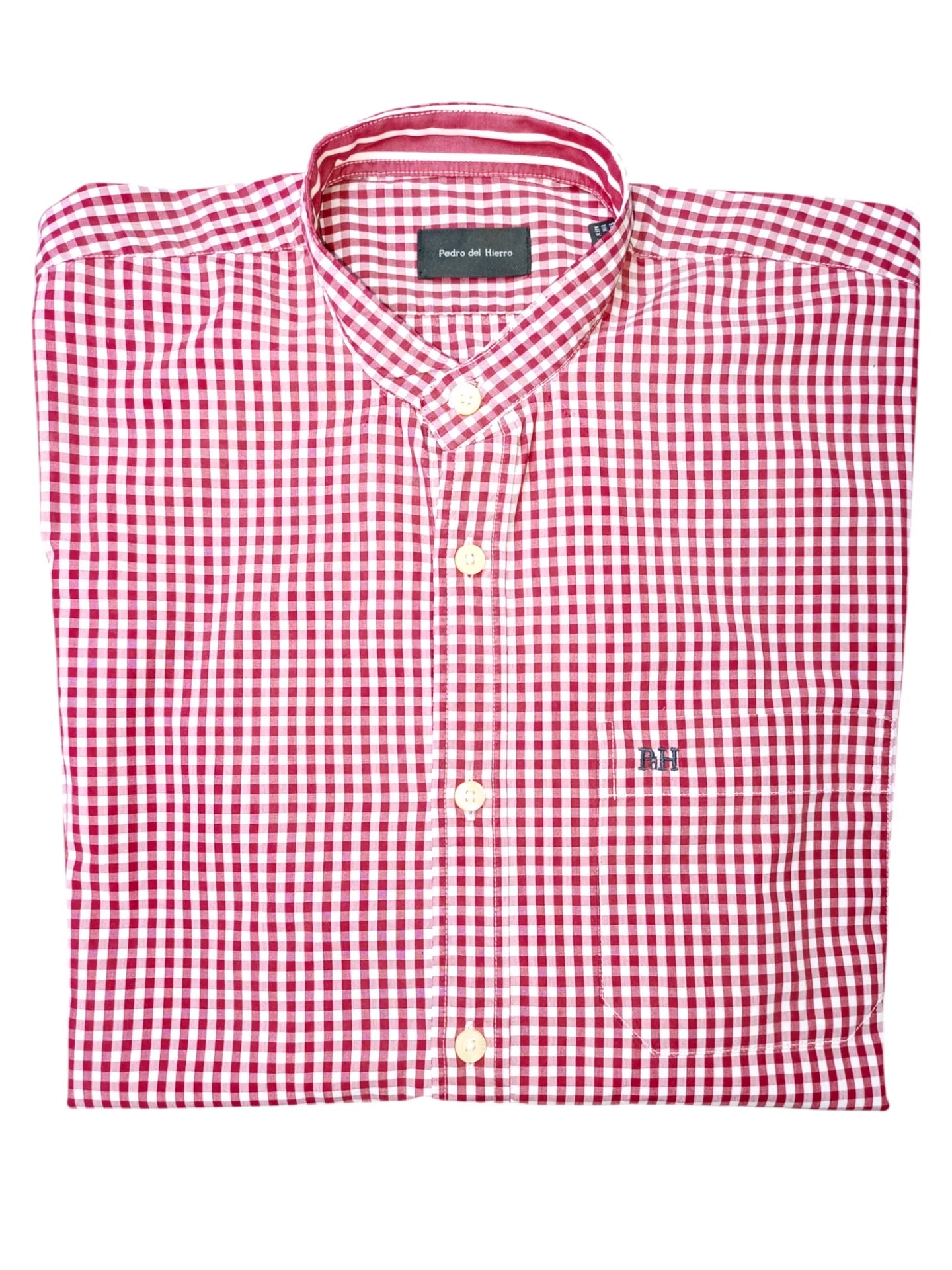 Red and white checkered shirt with a brand label on a white background